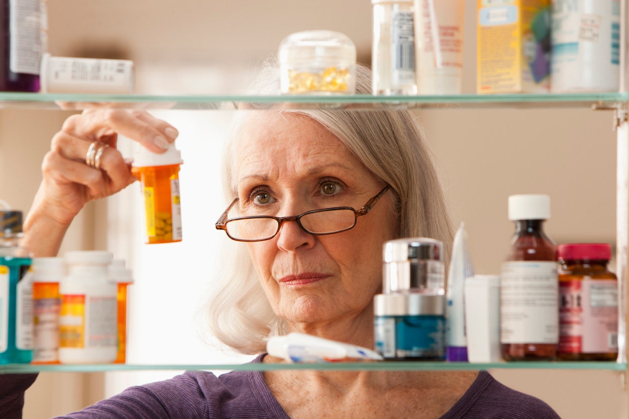 woman-at-medicine-cabinet.jpg