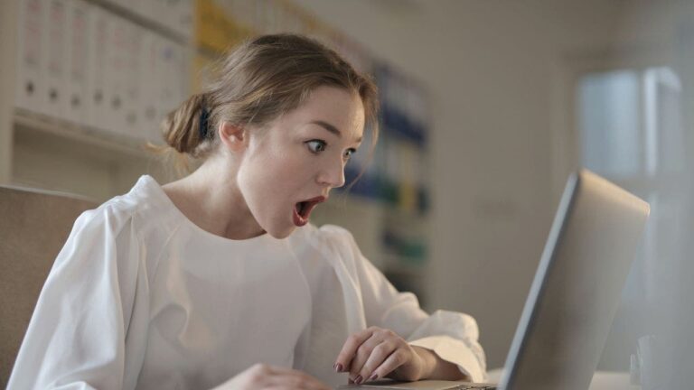 1-WOMAN-SHOCKED-AT-COMPUTER.jpg