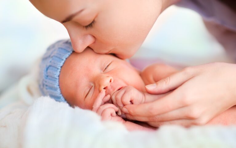 mom-kissing-preemie-baby.jpg