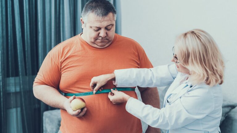 obese-man-with-doctor.jpg