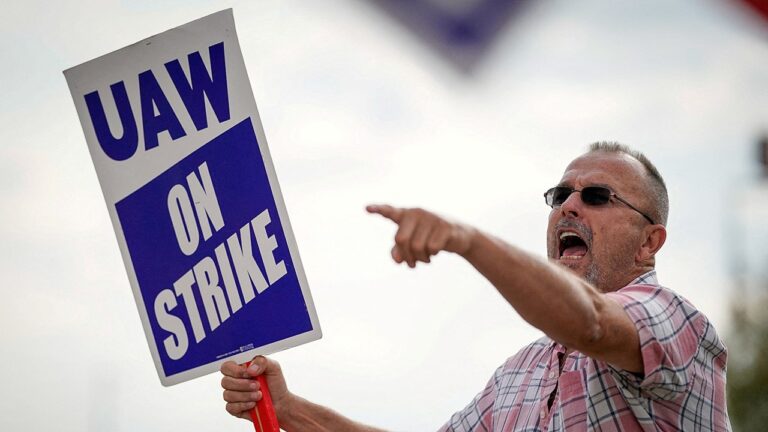 uaw-worker-on-strike.jpg