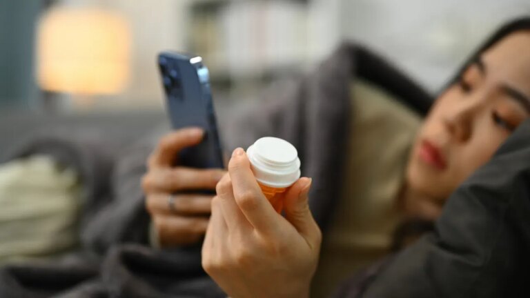 woman-holding-prescription-phone.jpg