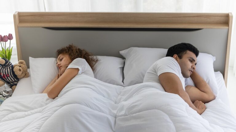 couple-sleeping-apart.jpg