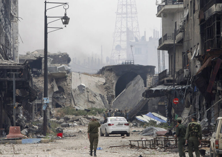 2014-05-09T120000Z_753251551_GM1EA591OQ601_RTRMADP_3_SYRIA-CRISIS-HOMS-1-scaled.jpg