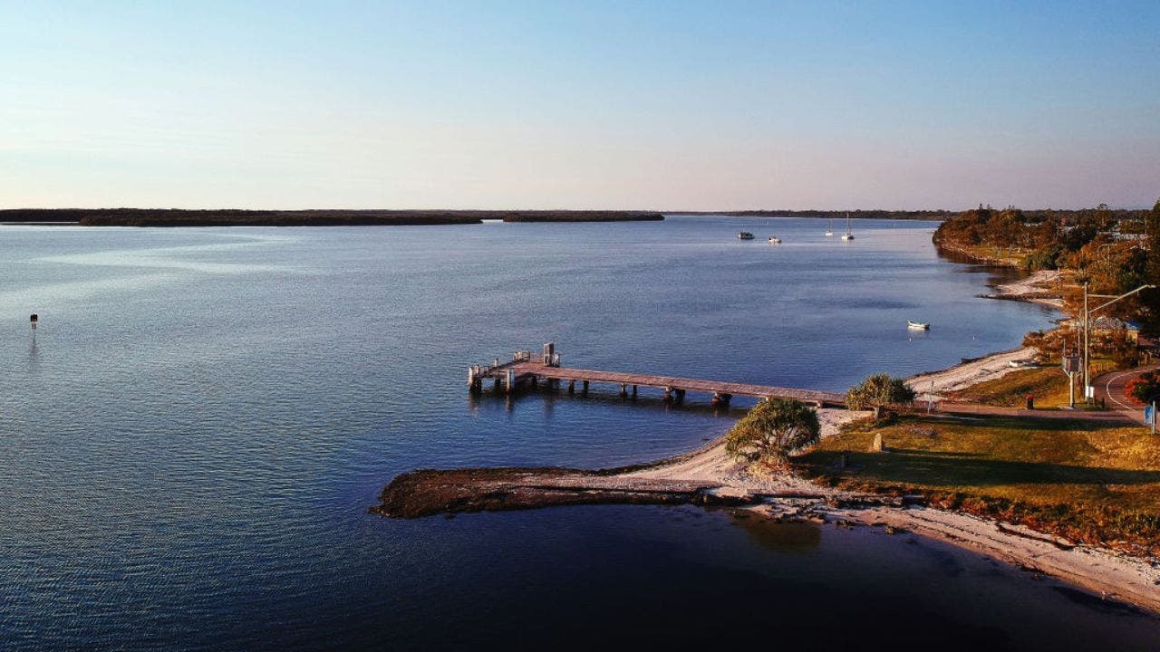 A-view-above-the-northern-entrance-to-Pumicestone-Passage-a-narrow-channel-of-water-that-separates-Bribie-Island-from-the-Australian-mainland.-The-35km-long-waterway-stretches-from-Caloundra-on-.jpg