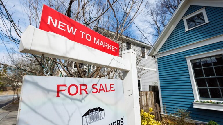 REAL-ESTATE-MARKET-SIGN-GETTY.jpg