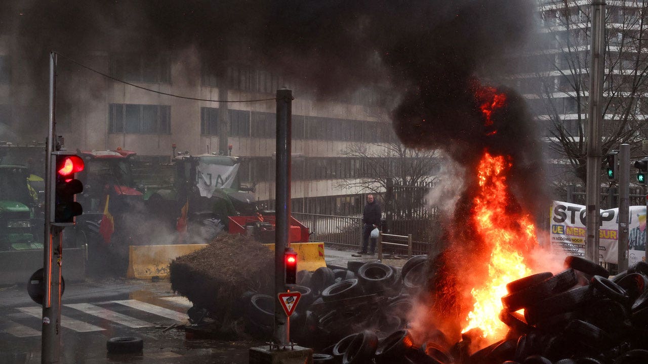 Europe-Farmer-Protest-Burning-Tires.jpg