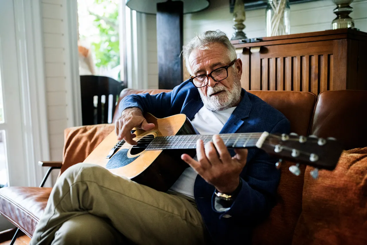 senior-man-playing-guitar.jpg