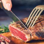 woman-cutting-steak.jpg