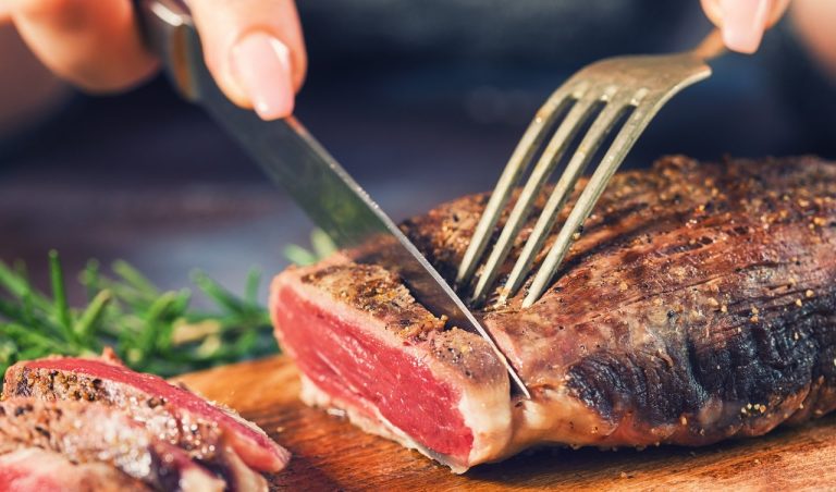 woman-cutting-steak.jpg