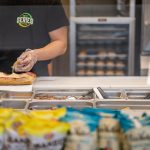 Subway-worker-makes-sandwhich.jpg