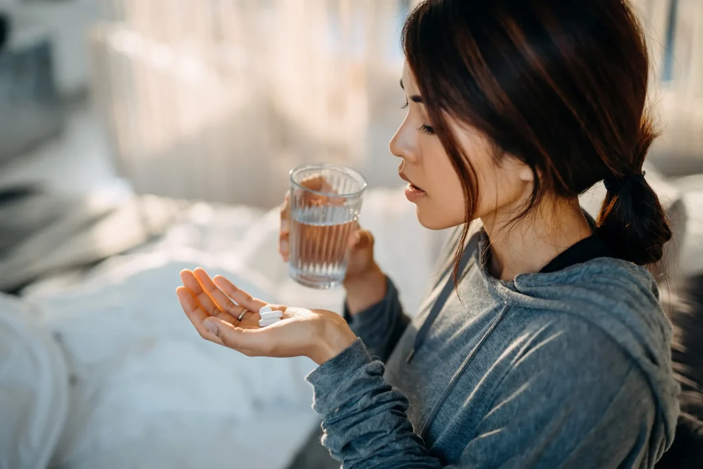 woman-holding-pills.jpg